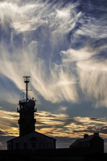Cirrus fibratus clouds and semaphore at the Pointe du Raz