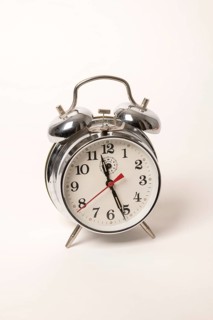 Metal alarm clock with mechanical clockwork and bell mechanism