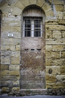 Doorway along cobbled street