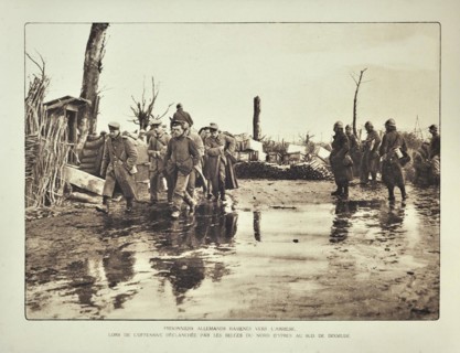 Convoy with German prisoners marching from Ypres to Diksmuide in Flanders during the First World War