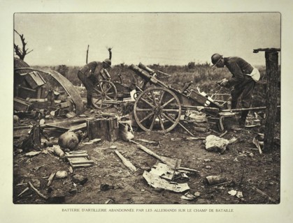 Soldiers and abandoned German artillery battery