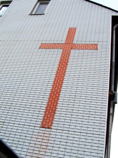 Cross on house facade