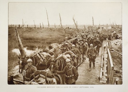 Cavalry heading for the battlefield through bombarded terrain in Flanders during the First World War