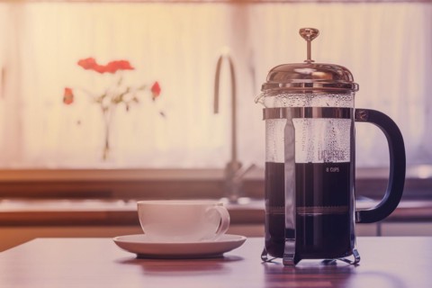 Coffee cafetiere with cup and saucer applied vintage film look