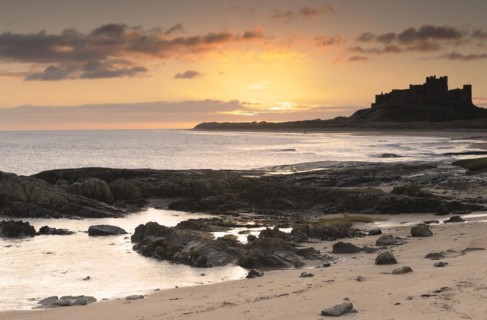 Bamburgh castle at dawn