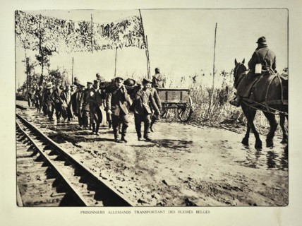 German prisoners evacuating wounded Belgian soldiers on stretchers in Flanders during the First World War