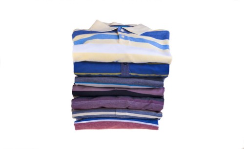 Stack of freshly laundered polo shirts