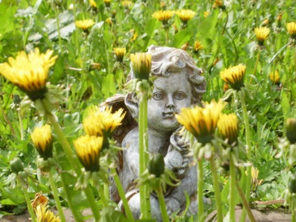 Angel figure in a meadow
