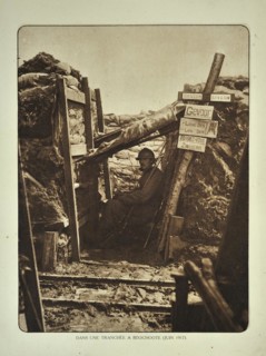 Soldier with rifle in trench at Bikschote in Flanders during the First World War