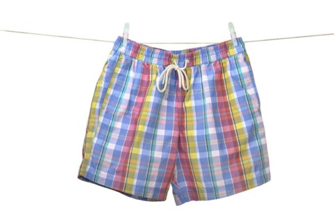 Swim shorts hanging on a washing line