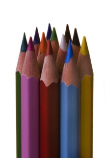 Coloured pencils standing in a column