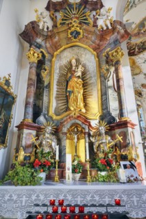 Side altar with offering candles