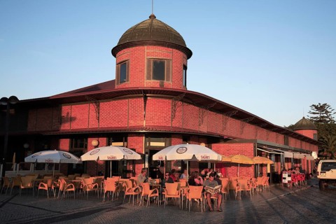 Evening atmosphere at the market hall of Olhao
