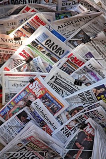 International daily newspapers at a kiosk