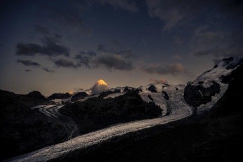 Morteratsch glacier in Bernina group with dramatic clouds