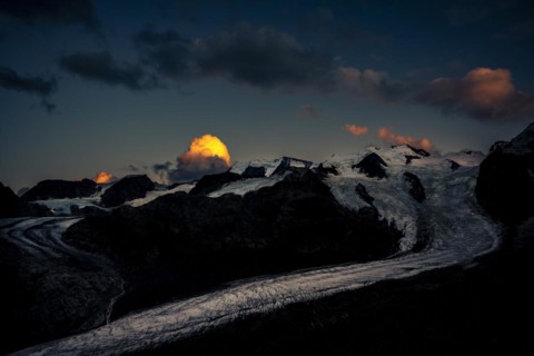 Morteratsch glacier in Bernina group with dramatic clouds