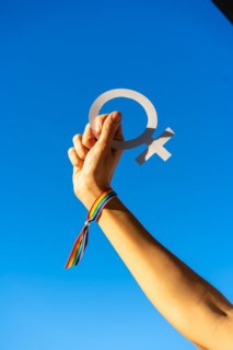 A woman with female symbol in favor of feminism