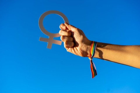 A woman with female symbol in favor of feminism