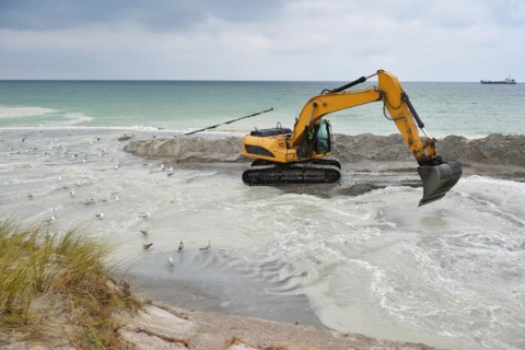 Dredger for land reclamation on a construction site in the Baltic Sea near Ahrenshoop