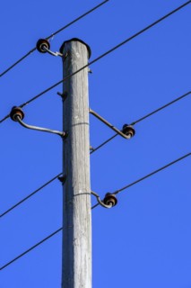 Wooden electricity pylon with ceramic insulators