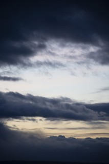Cloud hole at sunset