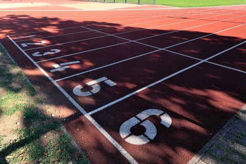 Starting places 1 to 6 on a tartan running track