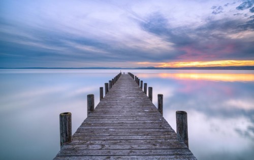 Lake Neusiedl with jetty at sunset