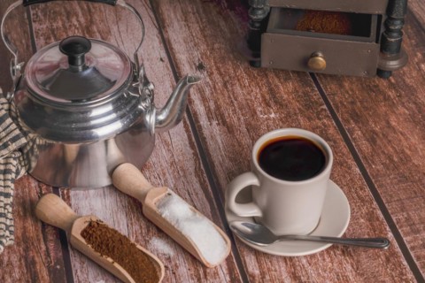 Coffee cup with milk jug