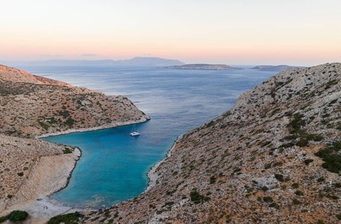 Sailing catamaran in a bay of Levitha Island