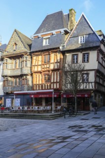 Half-timbered houses clad in slate on the Place du General Leclerc