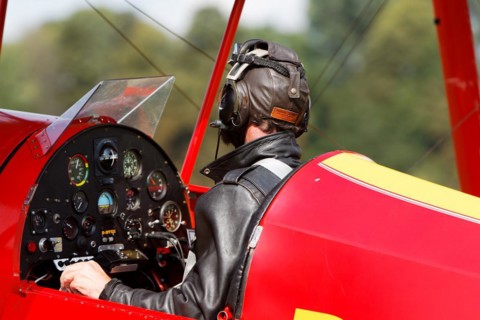 Pilot in his biplane