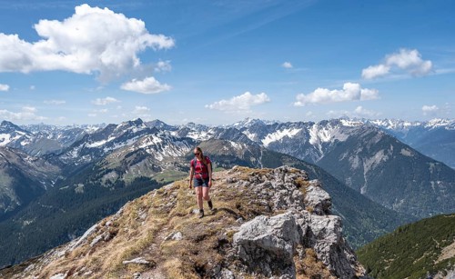 Hiker on hiking trail to Thaneller