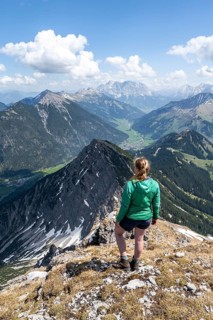 Hiker at the summit of Thaneller