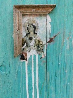 Remainder of a weathered picture frame from an old Madonna picture