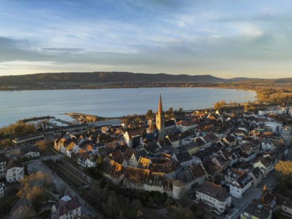 Aerial view of the town of Radolfzell on Lake Constance with the Radolfzell Minster at sunrise