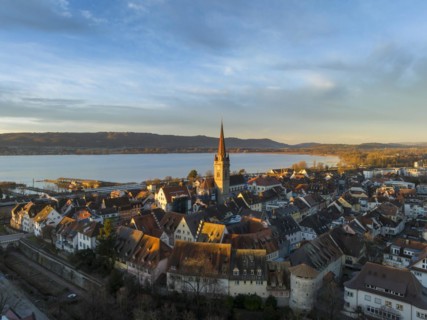 Aerial view of the town of Radolfzell on Lake Constance with the Radolfzell Minster at sunrise