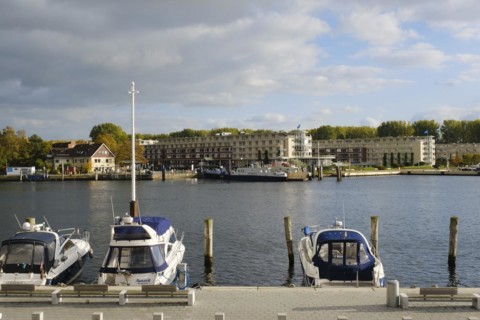 Car ferry Priwallfaehre in front of Rosenhof senior citizens residential home