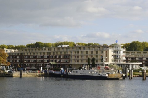 Car ferry Priwallfaehre in front of Rosenhof senior citizens residential home