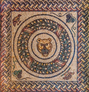 Medallions with animal heads in pery style
