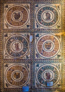 Medallions with animal heads in pery style