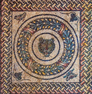 Medallions with animal heads in pery style