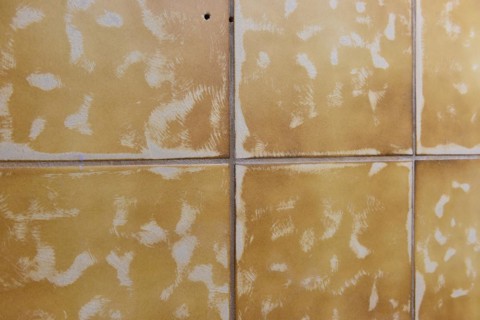 Tiler sanded off tiles to stick on new tiles