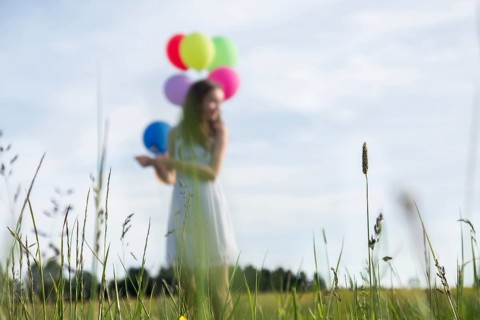 Little girl with balloons