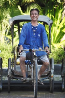 Laughing cycle rickshaw driver