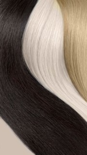 Strands of natural hair of different colors for extensions