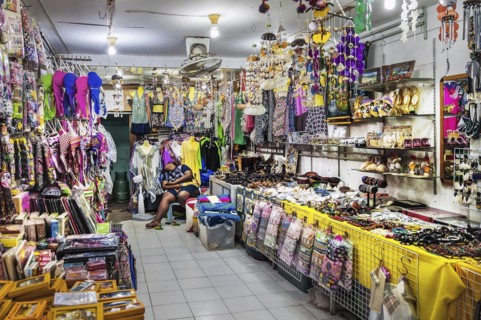 Souvenir shop with sleeping saleswoman on Ko Phi Phi island
