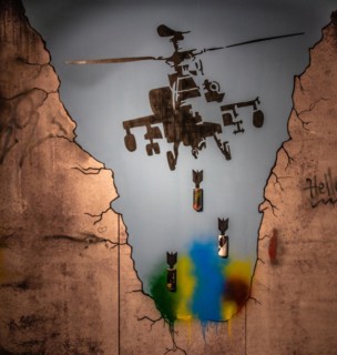 In 2005 Banksy painted nine pictures on the barrier in the West Bank on the border between Palestine and Israel