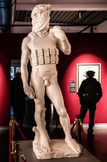 Suicide Bomber as an adaptation of Michelangelos David sculpture as a suicide bomber