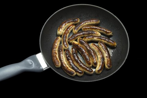 Freshly roasted Nuremberg sausages in a pan