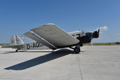 Propeller plane Ju 52 on the tarmac